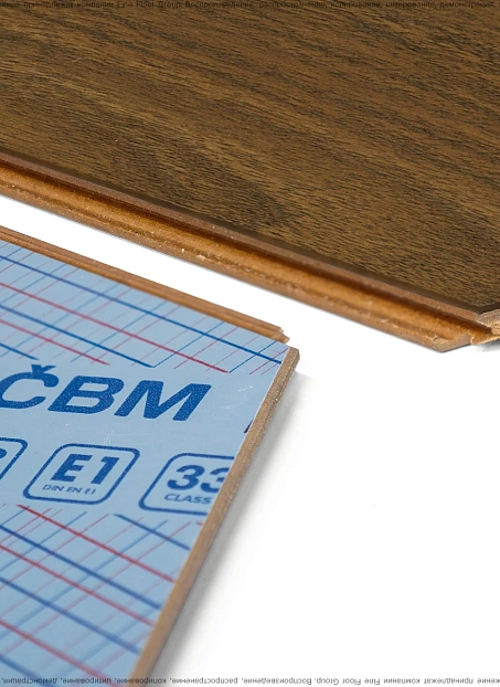 Ламинат CBM OSTROST Орех Марис сторона А